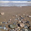 Big striped rock stone & sand background frame on beach