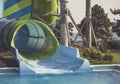 Big striped water slide for extreme descents on an inflatable circle