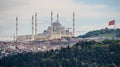 Big Suleymaniye Mosque in Istanbul and the flattering flag of Turkey on a pole against the blue sky Royalty Free Stock Photo
