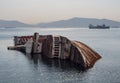 Big sunken ship Mediterranean Sky shipwreck off the coast of Greece at sunset Royalty Free Stock Photo