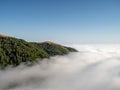 Big Sur California coast, bridge, beach, rocks, clouds, and surfing waves Royalty Free Stock Photo