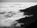 Big Sur California coast, bridge, beach, rocks, clouds, and surfing waves, black and white art photography Royalty Free Stock Photo