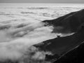 Big Sur California coast, bridge, beach, rocks, clouds, and surfing waves, black and white art photography Royalty Free Stock Photo