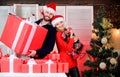 Big surprise for her. Preparing presents for christmas. New year gift. Gift from Santa Claus. Man and woman with gift Royalty Free Stock Photo