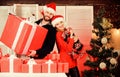 Big surprise for her. Preparing presents for christmas. New year gift. Gift from Santa Claus. Man and woman with gift Royalty Free Stock Photo