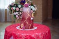 Big sweet multilevel wedding cake decorated with flowers. Concept of candy bar on party Royalty Free Stock Photo