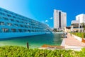 Big swimming pool with deck of a luxury hotel against blue sky Royalty Free Stock Photo