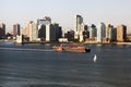 A big tanker passing by Hudson river and New Jersey skyline