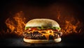 Big tasty cheeseburger with flame on dark background. Close up