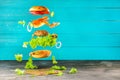 Big tasty home made burger with flying ingredients Royalty Free Stock Photo