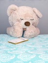 Big Teddy bear says good night prayers Royalty Free Stock Photo