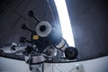 Big telescope under dome of astronomic observatory