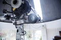 Big telescope under dome of astronomic observatory