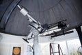 Big telescope under dome of astronomic observatory