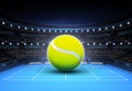 Big tennis ball placed on a blue court