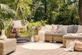 A big terrace with a comfortable leisure sofa with cushions, a t