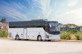 Big tourist buse on parking waiting for passengers on the city street Royalty Free Stock Photo