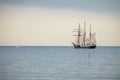 Big tourist ship and small yach on water landscape Royalty Free Stock Photo