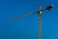 big tower crane against blue sky construction Royalty Free Stock Photo