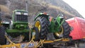 Big Tractor stuck on road while getting transported to showrooms