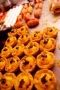 Big tray with different desserts, little hampers filled up and little sweet hotdogs