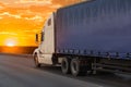 Big truck semi trailer moves on the highway Royalty Free Stock Photo