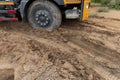 Big trucks drive on muddy roads. Royalty Free Stock Photo