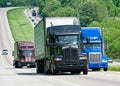 Trucks traveling along the highway