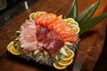 Big tuna in a restaurant, tuna head, tuna on the table, tuna, before preparing dishes, tuna in a plate, assorted, sushi with tuna Royalty Free Stock Photo