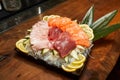 Big tuna in a restaurant, tuna head, tuna on the table, tuna, before preparing dishes, tuna in a plate, assorted, sushi with tuna Royalty Free Stock Photo