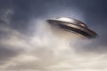 Big UFO emerging from the clouds Royalty Free Stock Photo