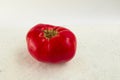 Big ugly tomato on a white background