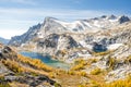 View over Perfection Lake and golden larches in enchantment lakes wilderness