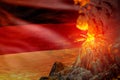 conical volcano blast eruption at night with explosion on Germany flag background, suffer from eruption and volcanic ash Royalty Free Stock Photo