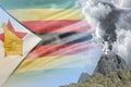 big volcano eruption at day time with white smoke on Zimbabwe flag background, problems of disaster and volcanic ash concept - 3D Royalty Free Stock Photo