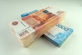 Million rubles in Russian rubles. big wad of money Russian banknotes on white background