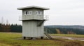 Big watchtower on border. Security of prison, military base Royalty Free Stock Photo