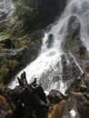 Big waterfall in tropical rain-forest.