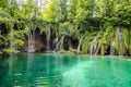 Big Waterfalls over the Turquoise Waters of the Lake in Plitvice National Park, Croatia. Natural Environment with Emerald Waters Royalty Free Stock Photo