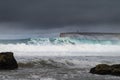 A big wave breaking at the Tonel Beach Praia do Tonel in Sagres, Algarve, Portugal Royalty Free Stock Photo