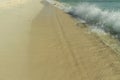 Big wave in Caribbean sea is breaking the coast. Eagle Beach of Aruba Island. Royalty Free Stock Photo