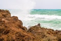 Big wave crashed about rocky seashore