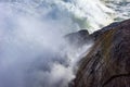 Big wave crashing against the rocks Royalty Free Stock Photo