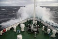 Big wave rolling over the ship