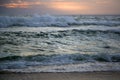 Big waves beat the shore on sunset Royalty Free Stock Photo