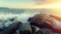 Big Waves Break On The Coastal Stones And Turn Into Foam Sea On The Horizon And Sunset Royalty Free Stock Photo