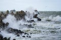 Big waves breaking on breakwater during storm in baltic sea Royalty Free Stock Photo