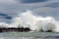 Big waves breaking on breakwater Royalty Free Stock Photo