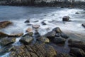 Big waves crash on rocky beach Royalty Free Stock Photo