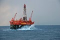 Big waves hitting a Semi submersible drilling rig Royalty Free Stock Photo